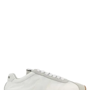 White fabric and suede sneakers