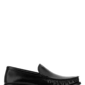 Black leather loafers