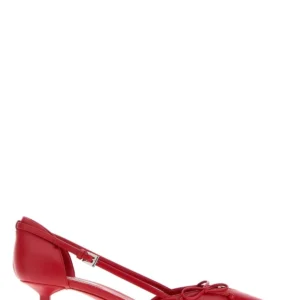 Red leather pumps