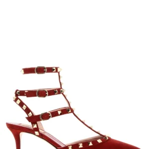 Red suede Rockstud pumps