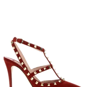 Red suede Rockstud pumps