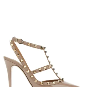 Light pink leather Rockstud pumps