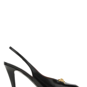 Black leather pumps