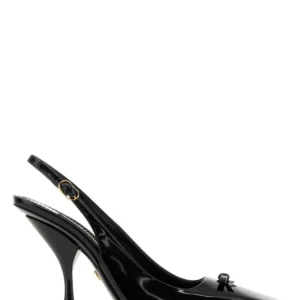 Black leather pumps