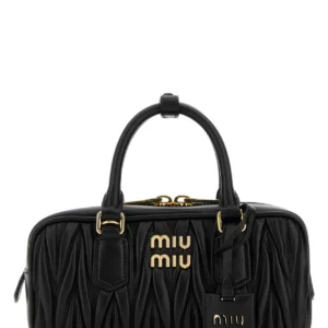 Black leather Arcadie handbag