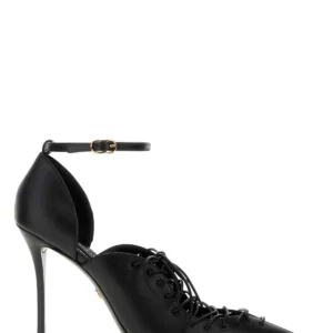 Black leather pumps